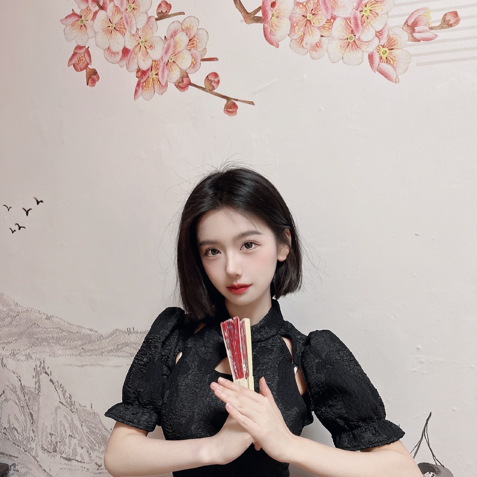 百里归尘。